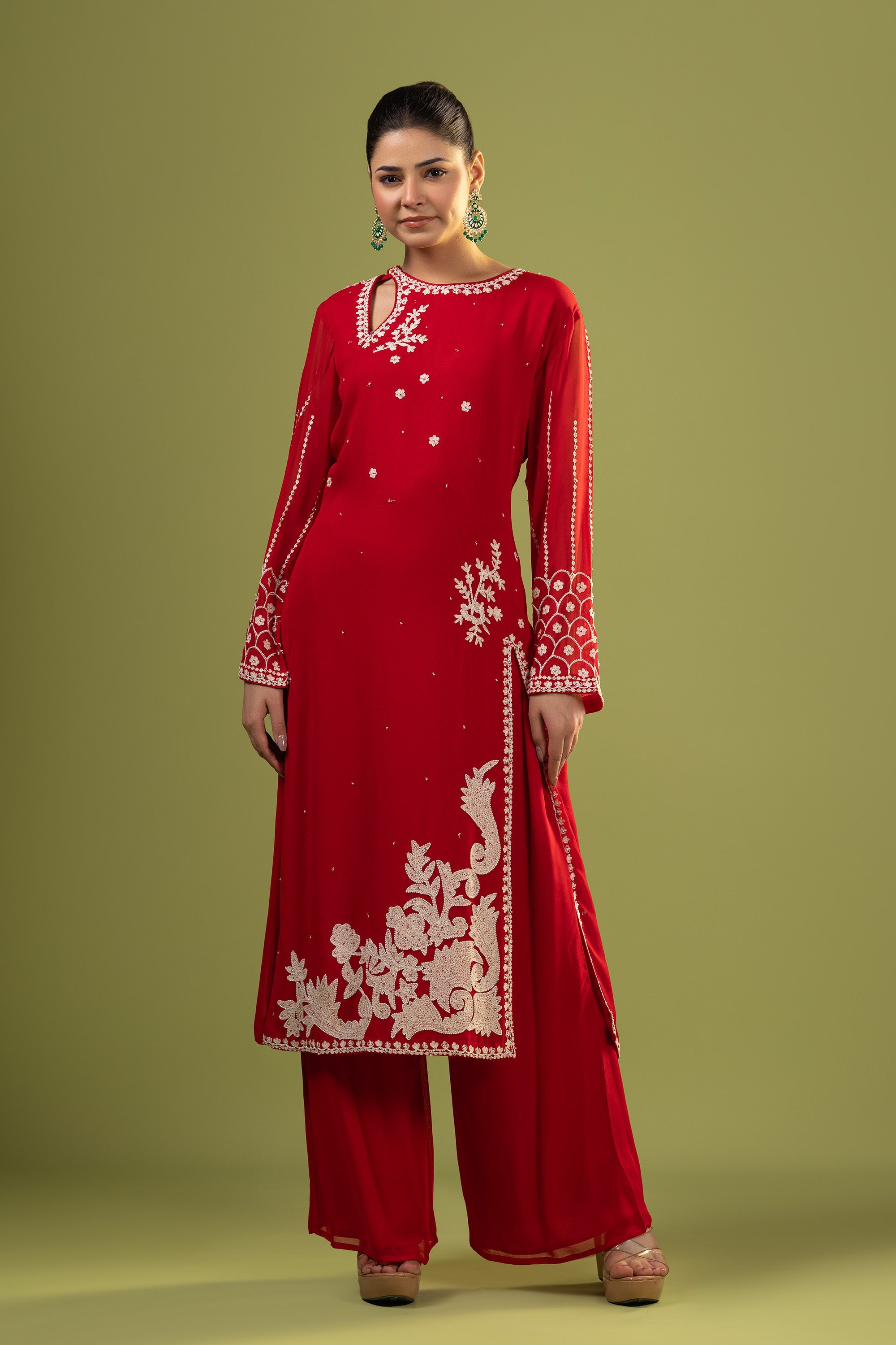 Red suit with aari work