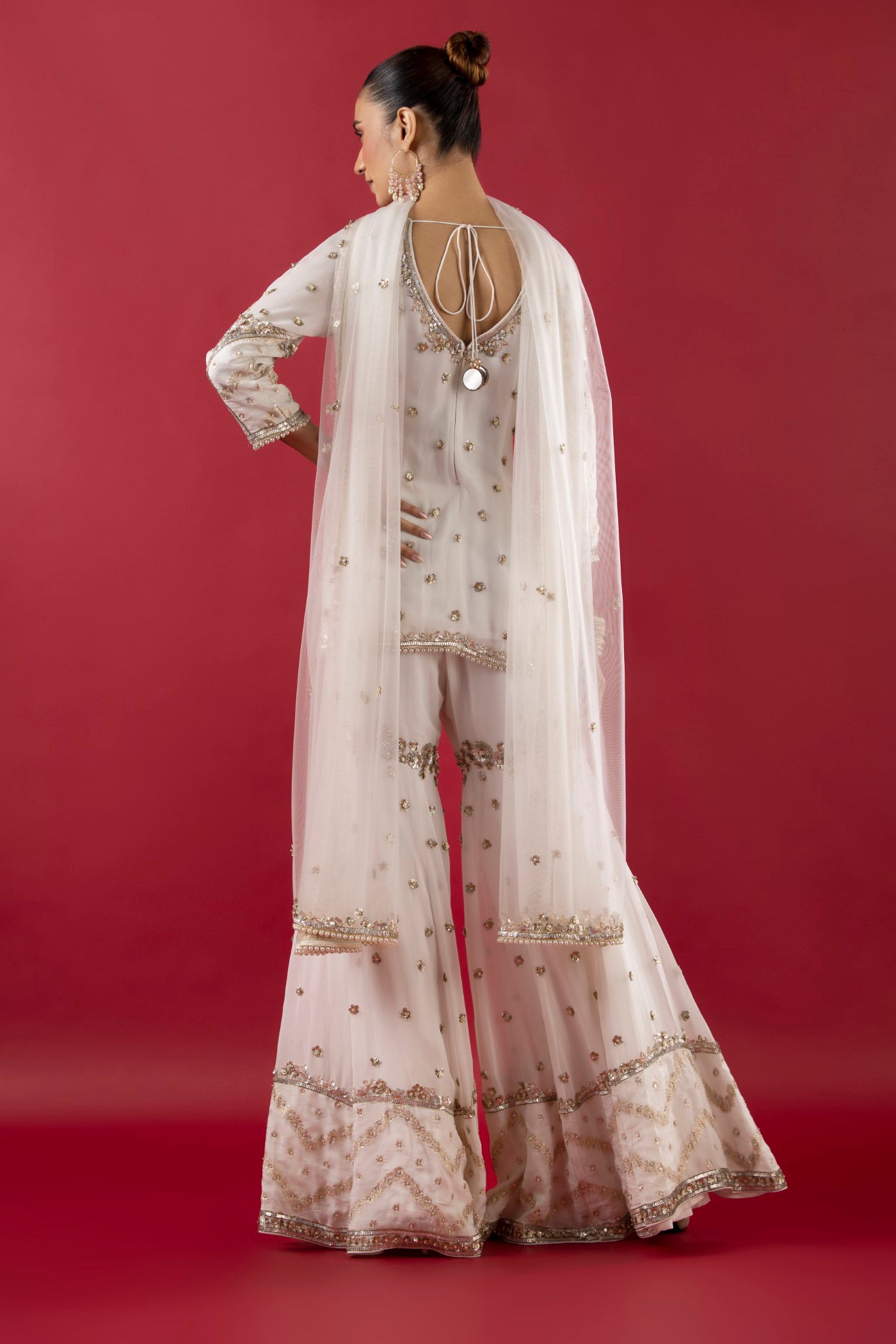 White Georgette Gharara Suit With Pearl, Sequins And Poth Work