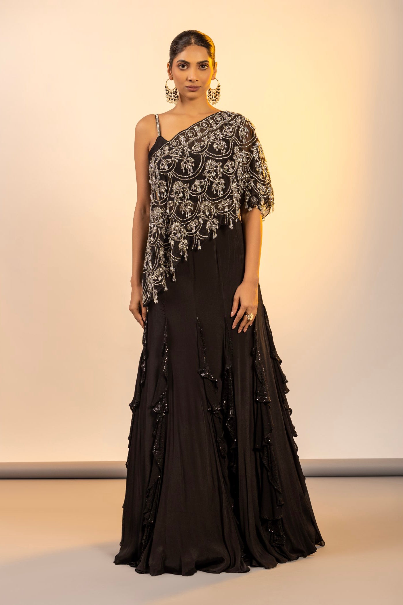 Black crop top and skirt with poncho