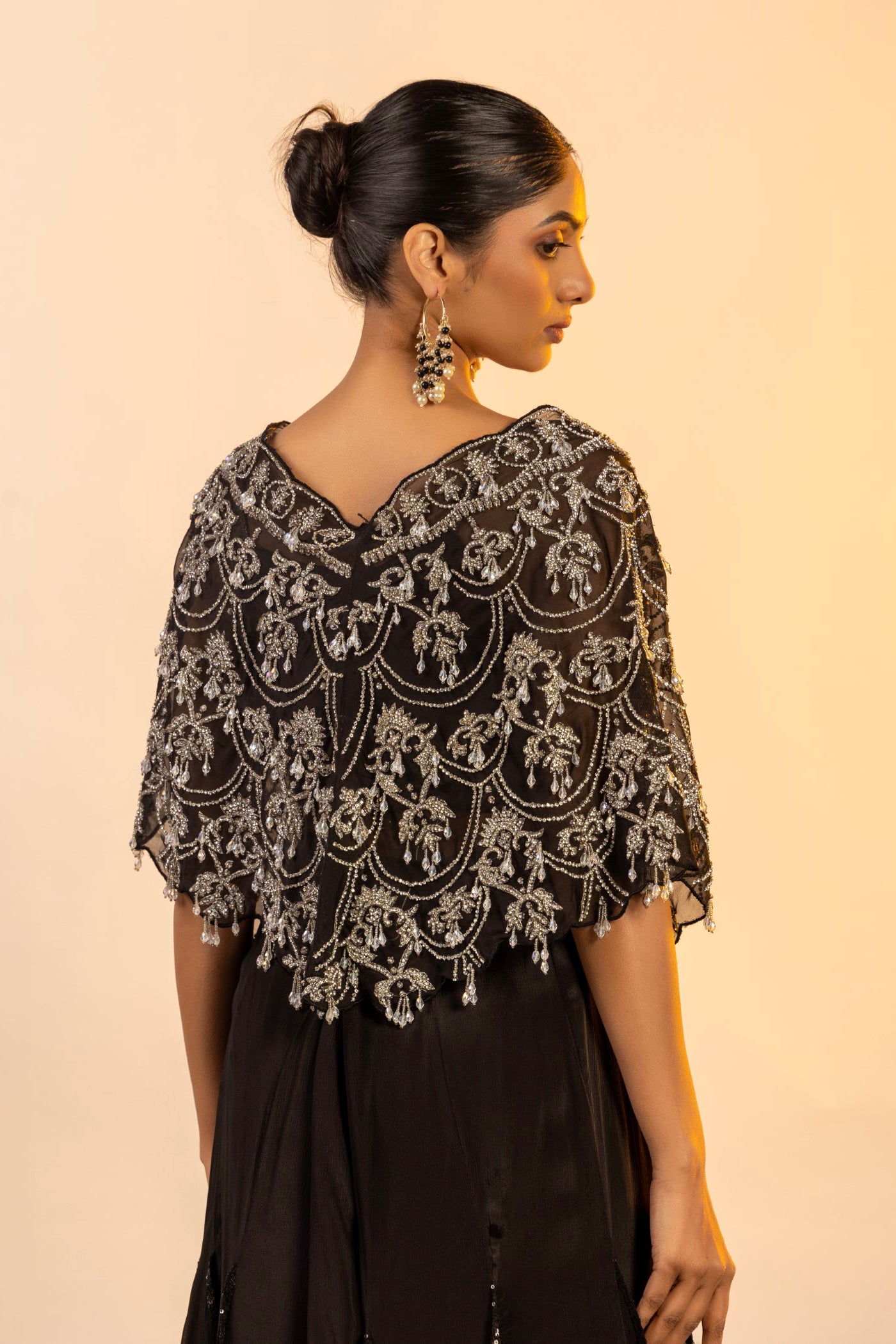 Black crop top and skirt with poncho