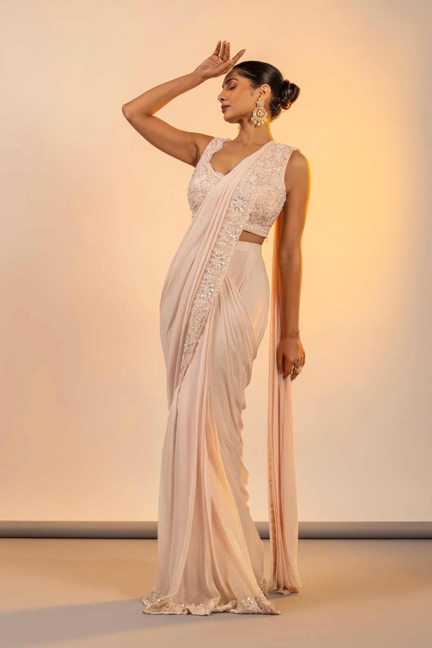 Blush pink drape saree with cutdana and sequins