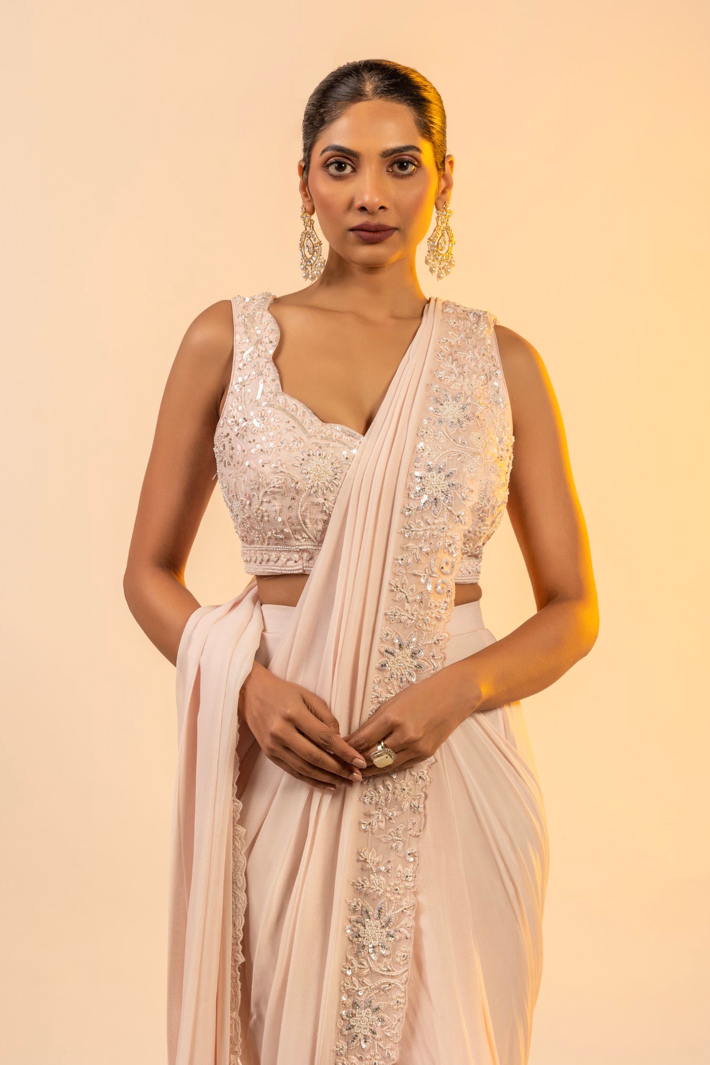 Blush pink drape saree with cutdana and sequins