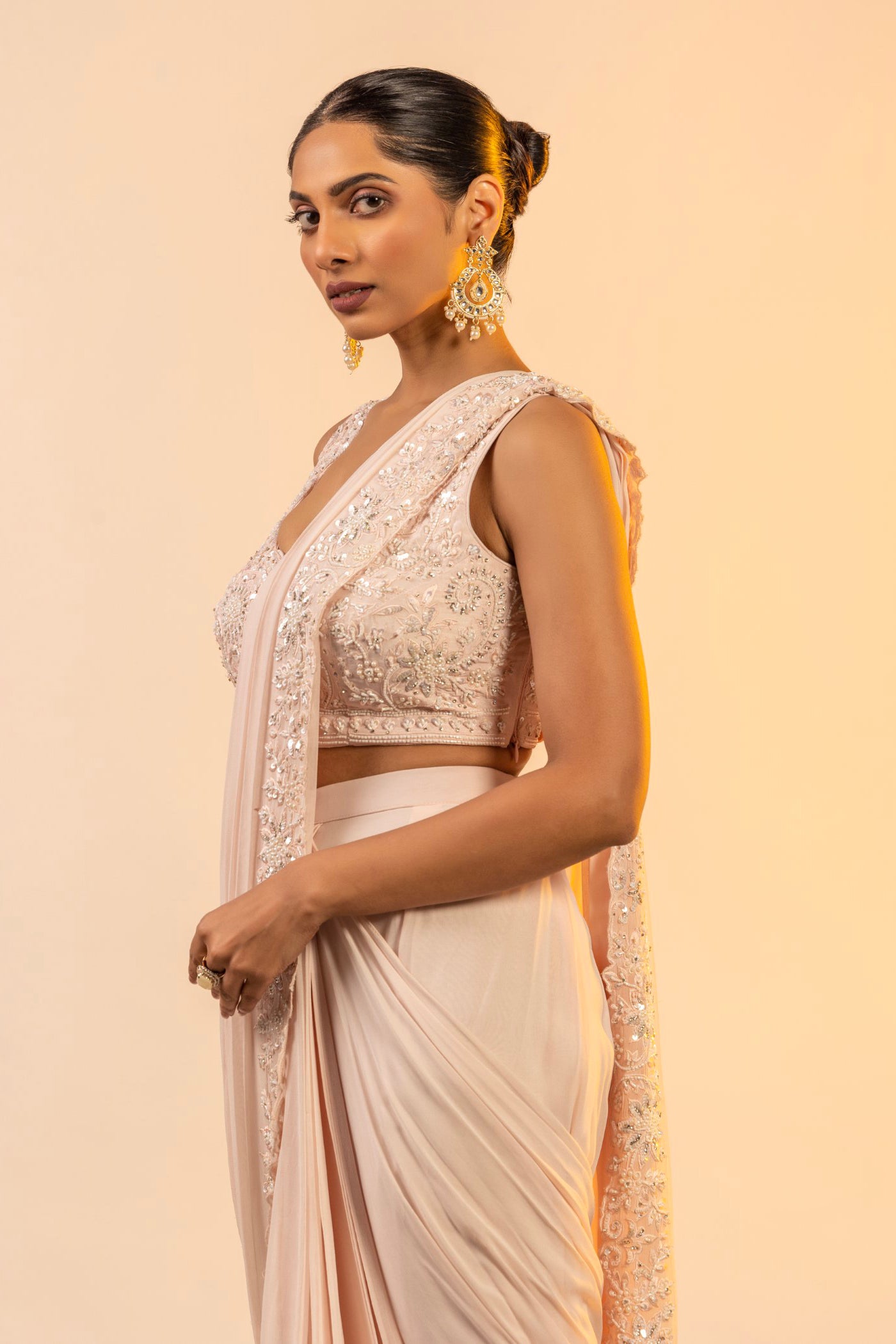 Blush pink drape saree with cutdana and sequins