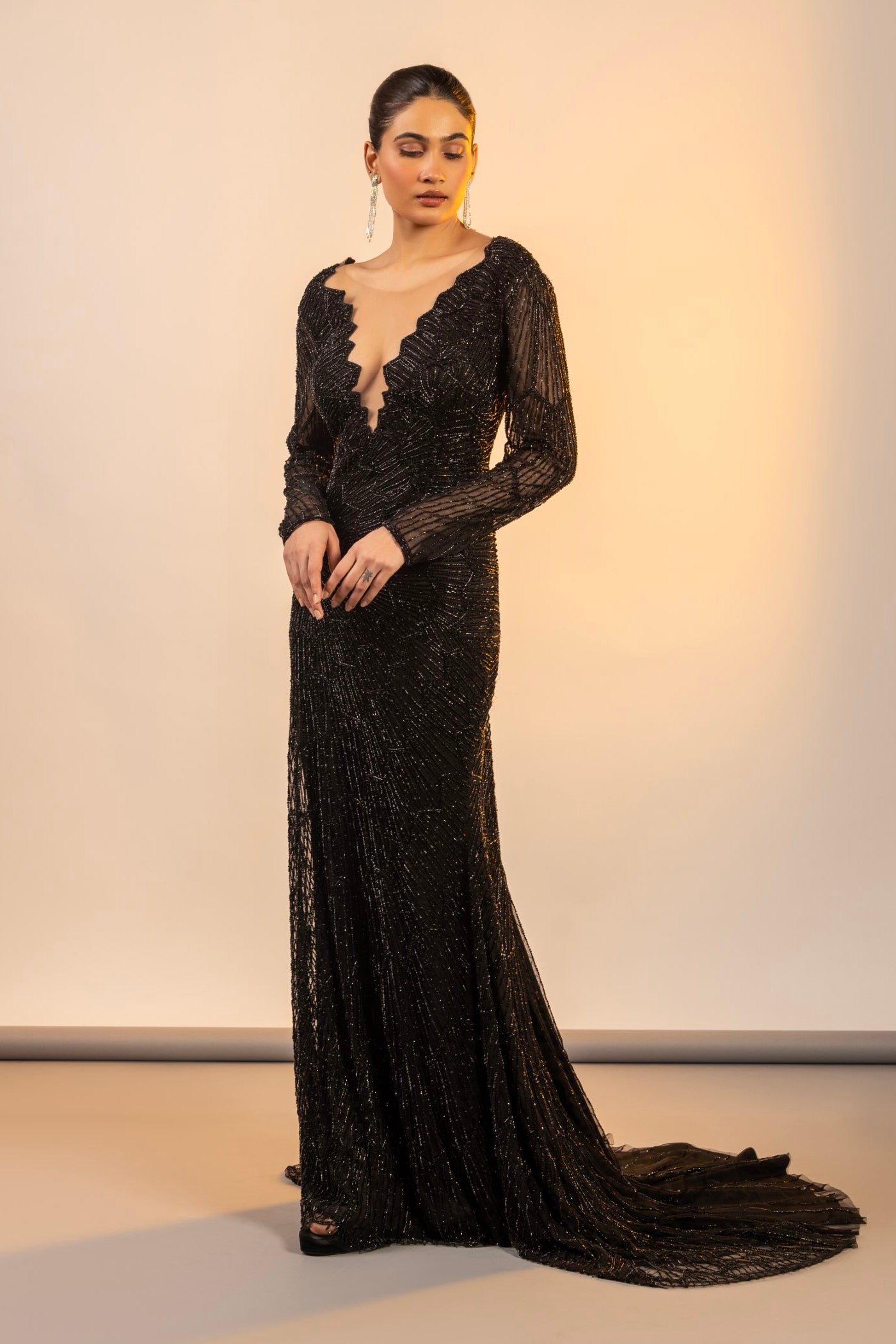 Black one piece dress with cutdana and poth
