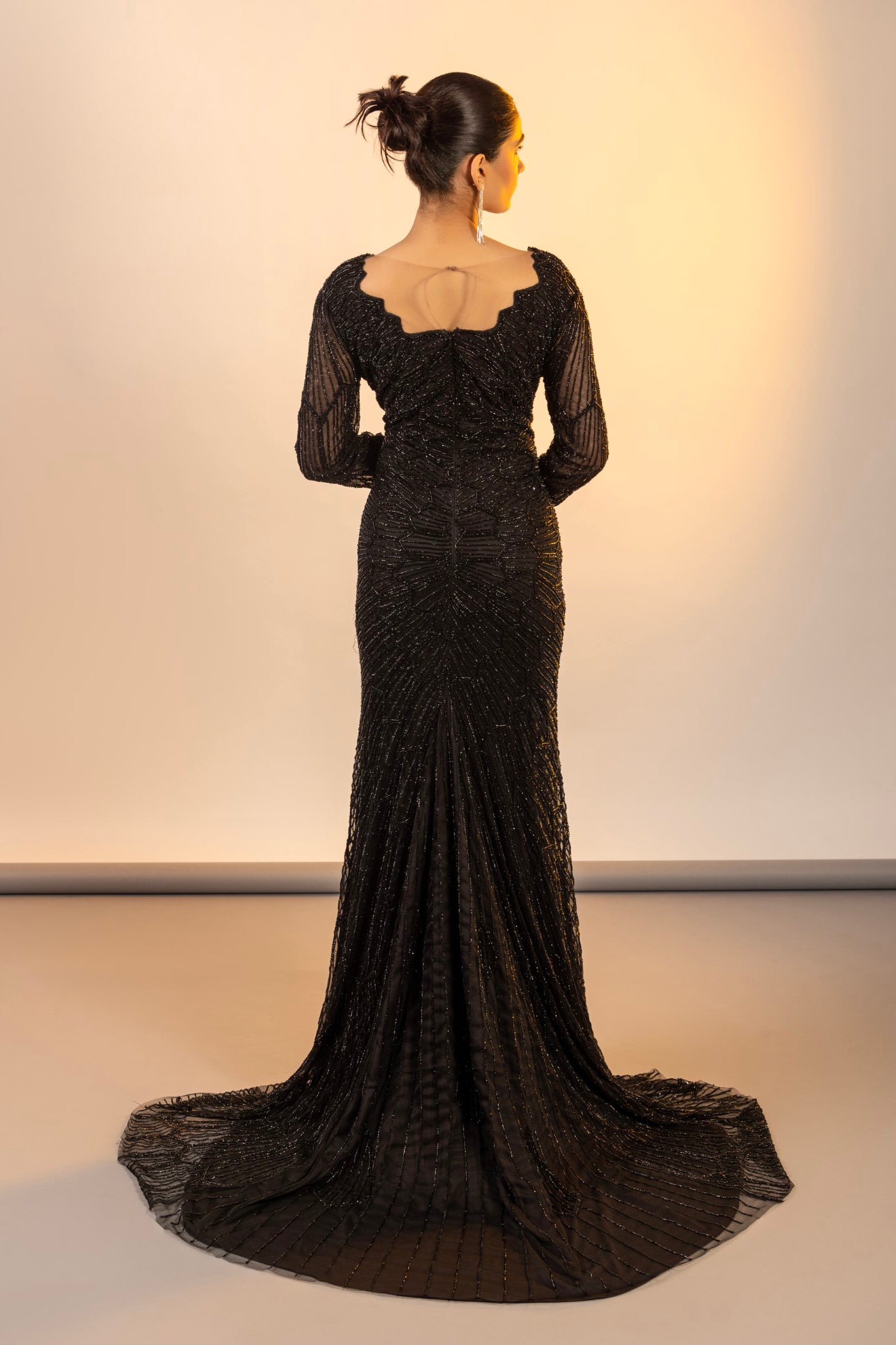 Black one piece dress with cutdana and poth