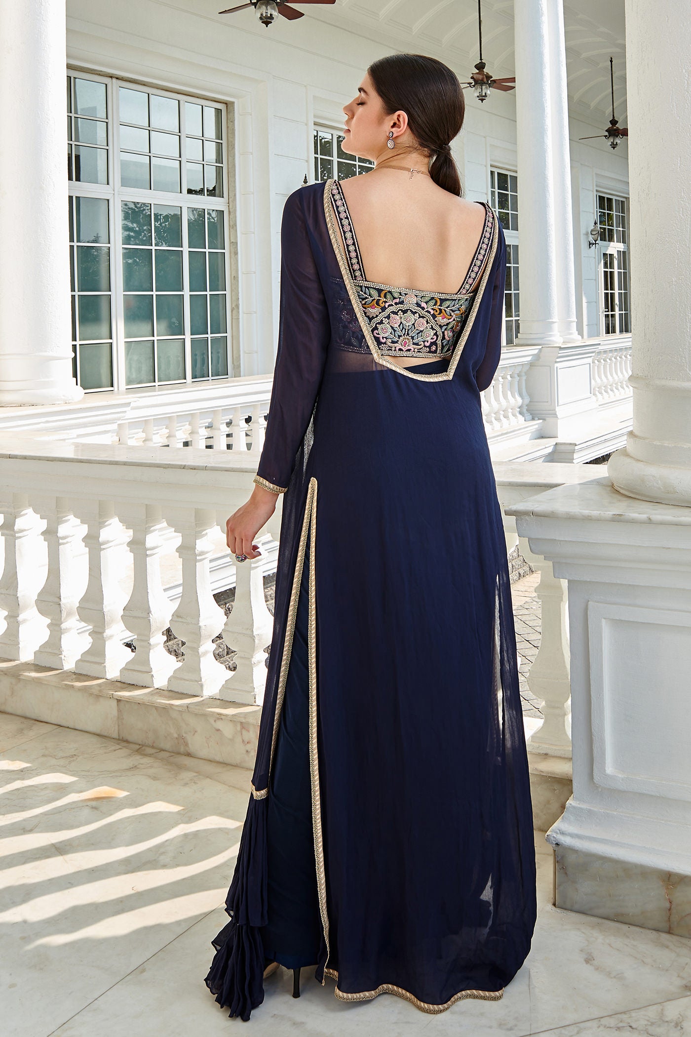 Exotic cape and jacket set with dhoti