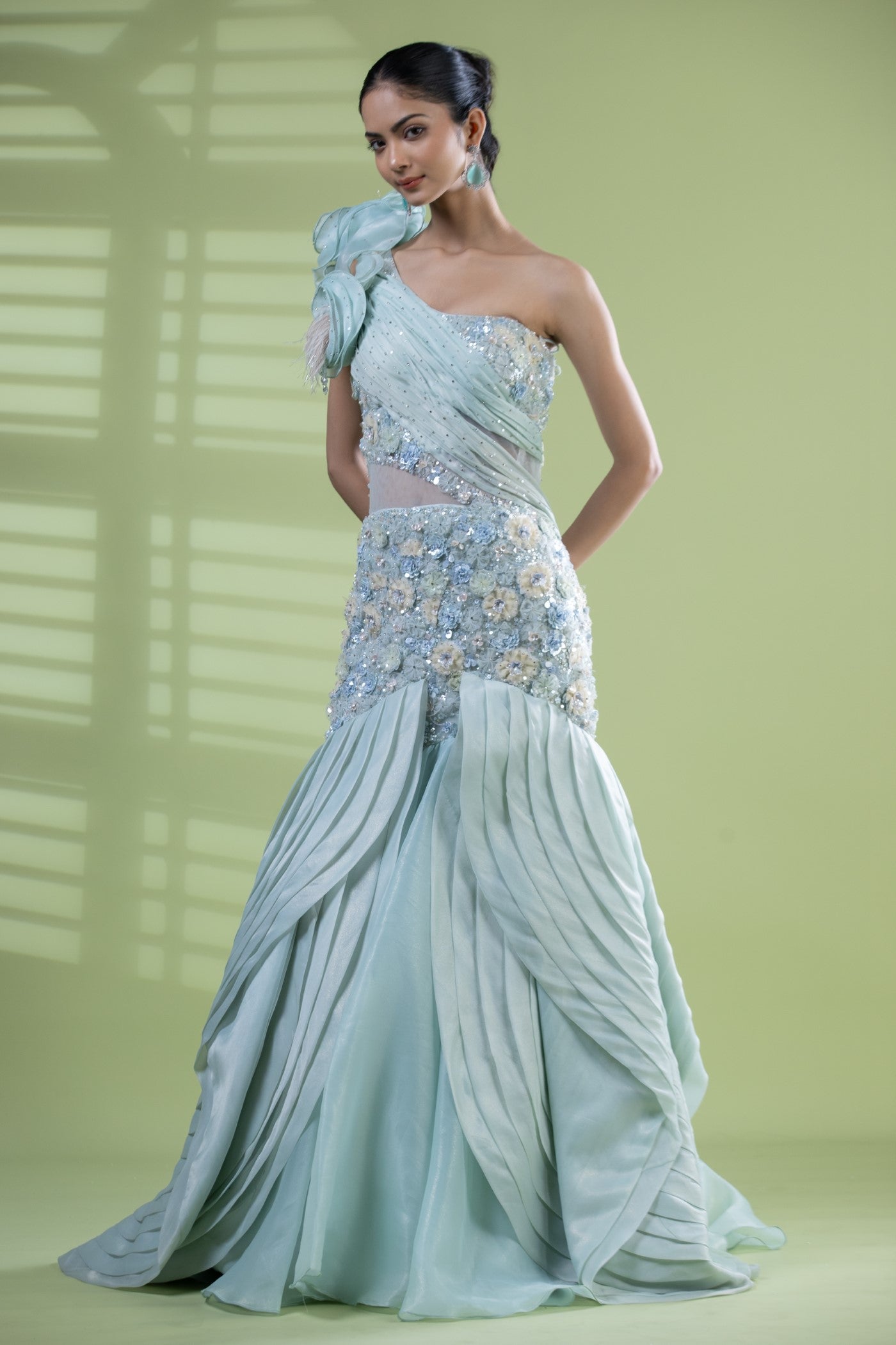 Aqua organza gown with crystal and hand made net