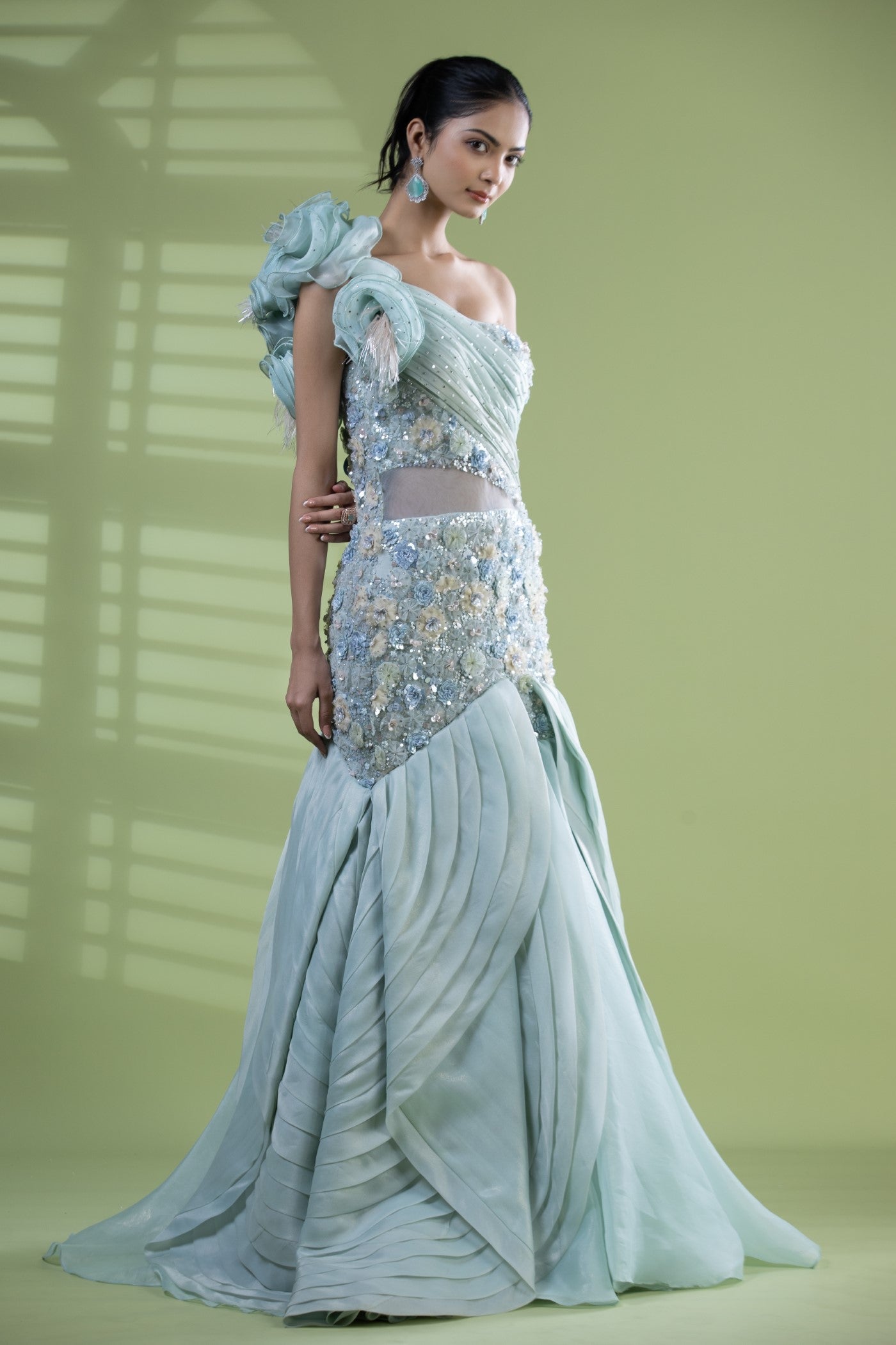 Aqua organza gown with crystal and hand made net