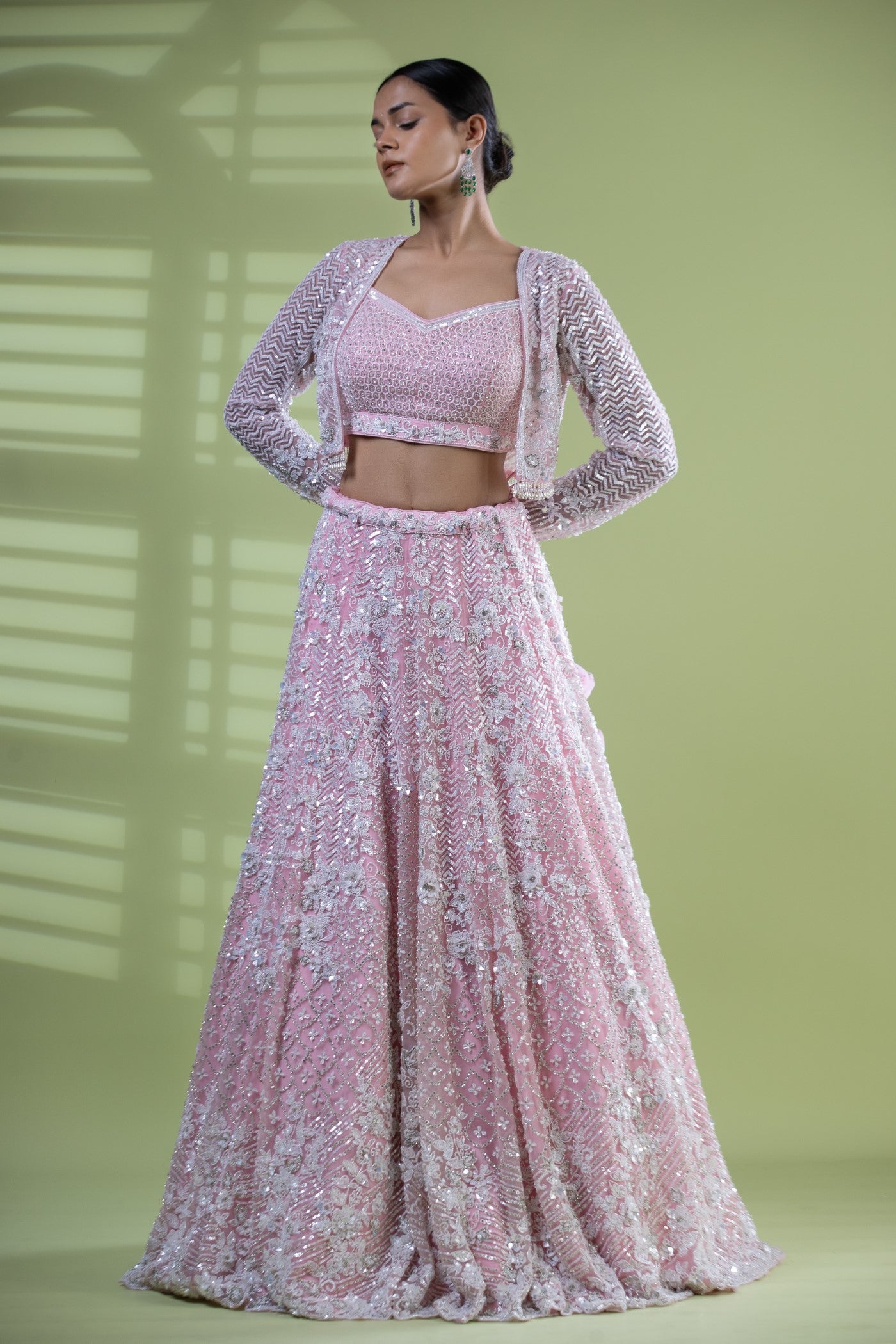 Pink short choli with lehenga and jacket