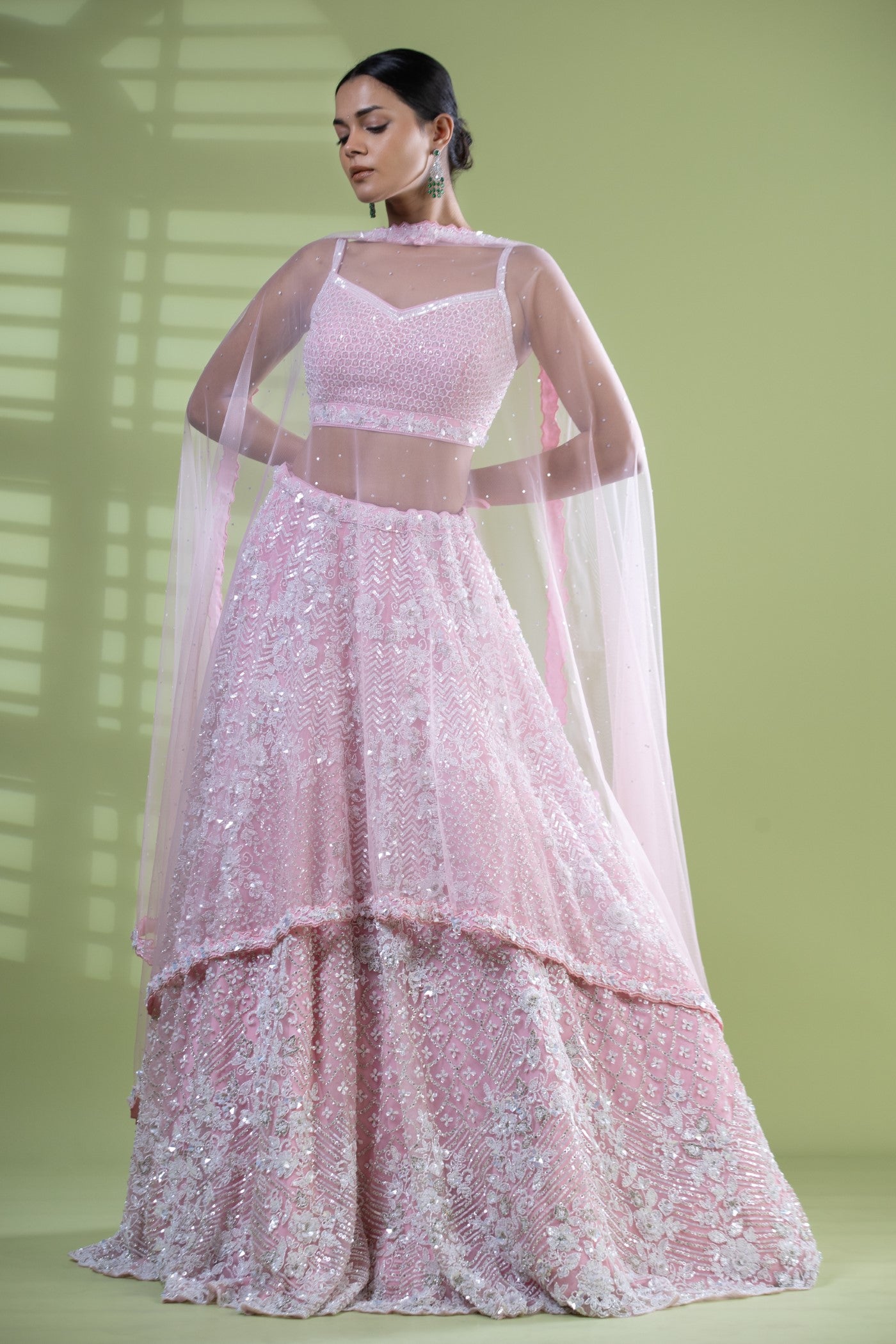 Pink short choli with lehenga and jacket