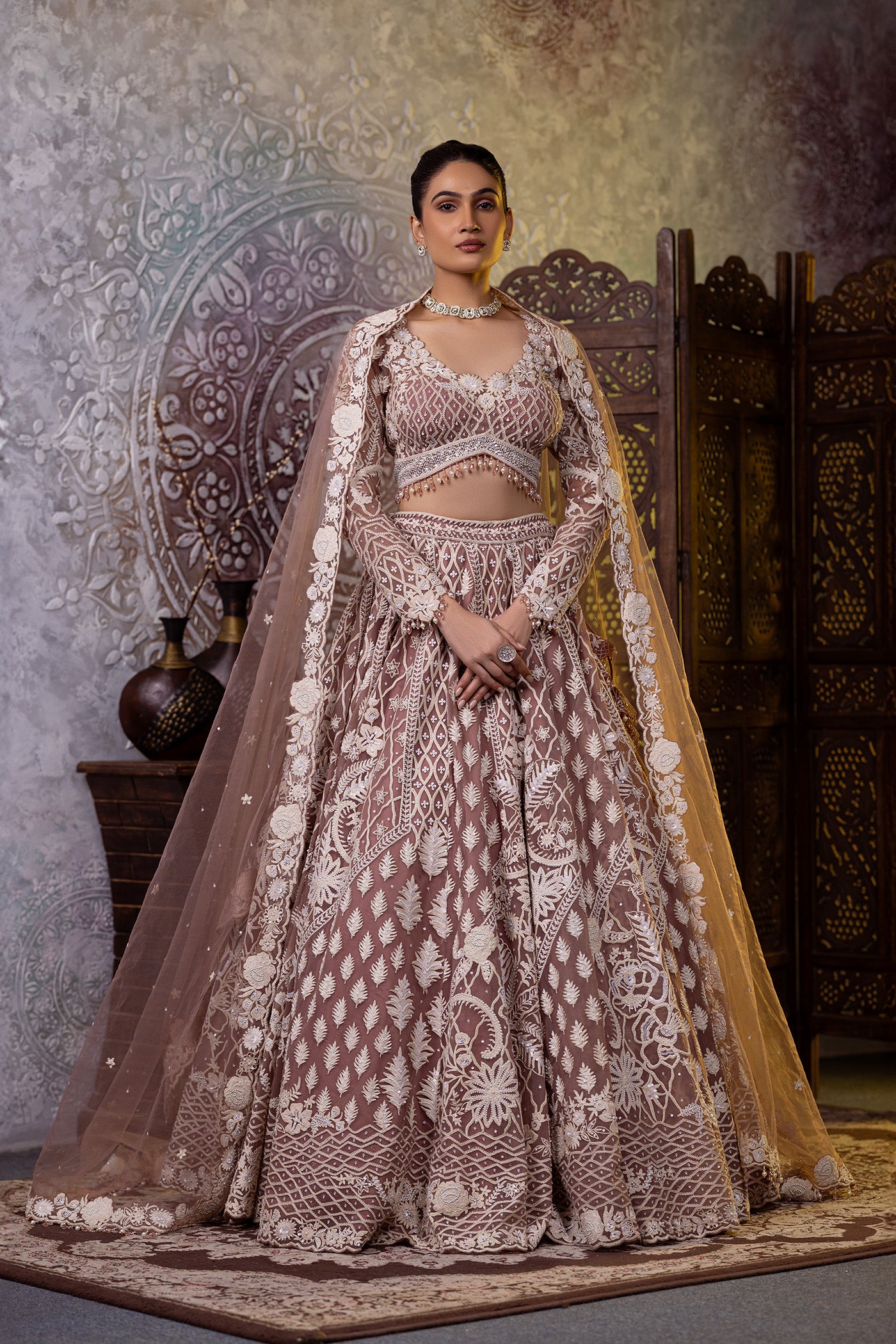 Net blush lehenga choli with dupatta