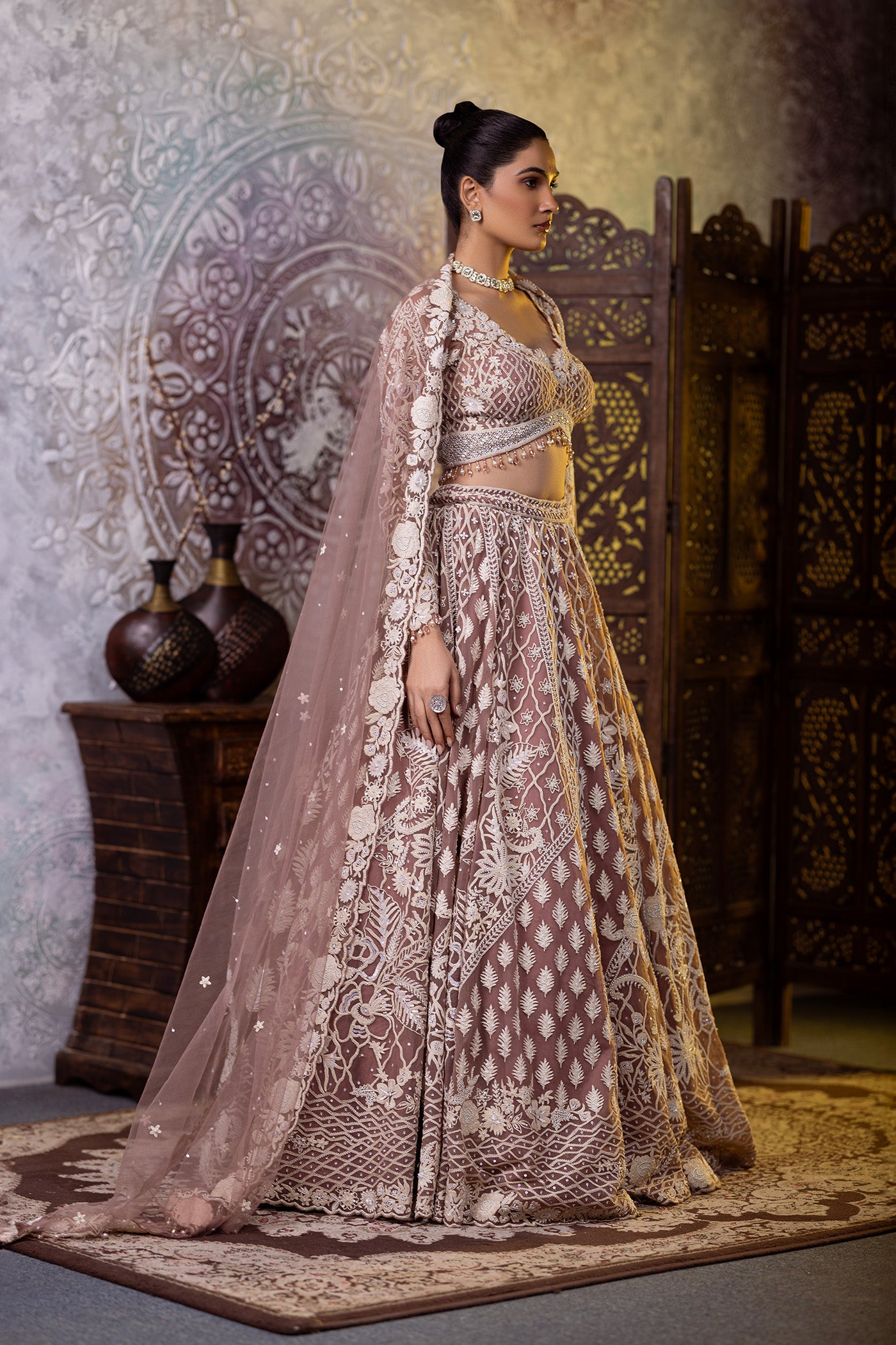 Net blush lehenga choli with dupatta