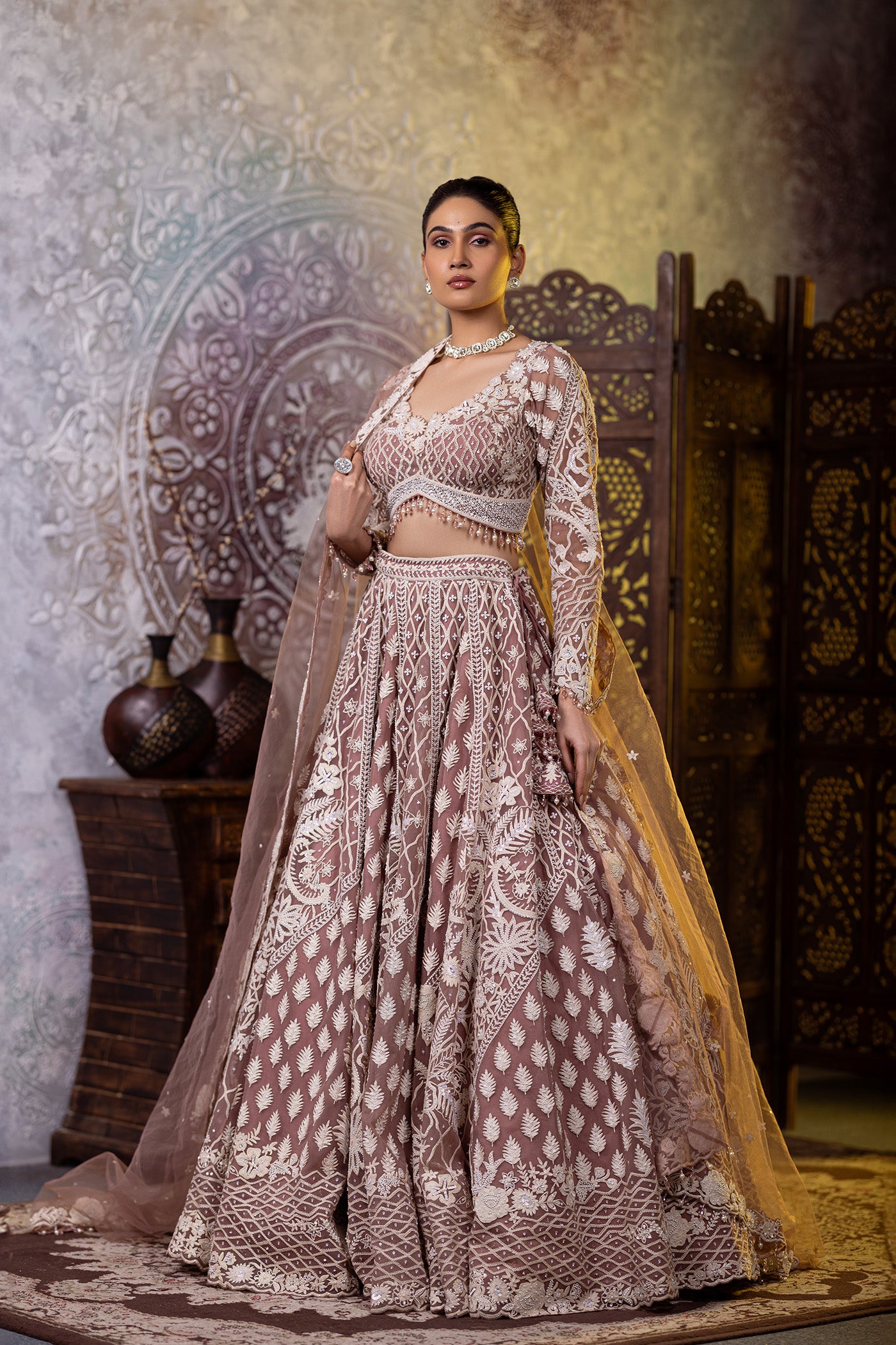 Net blush lehenga choli with dupatta