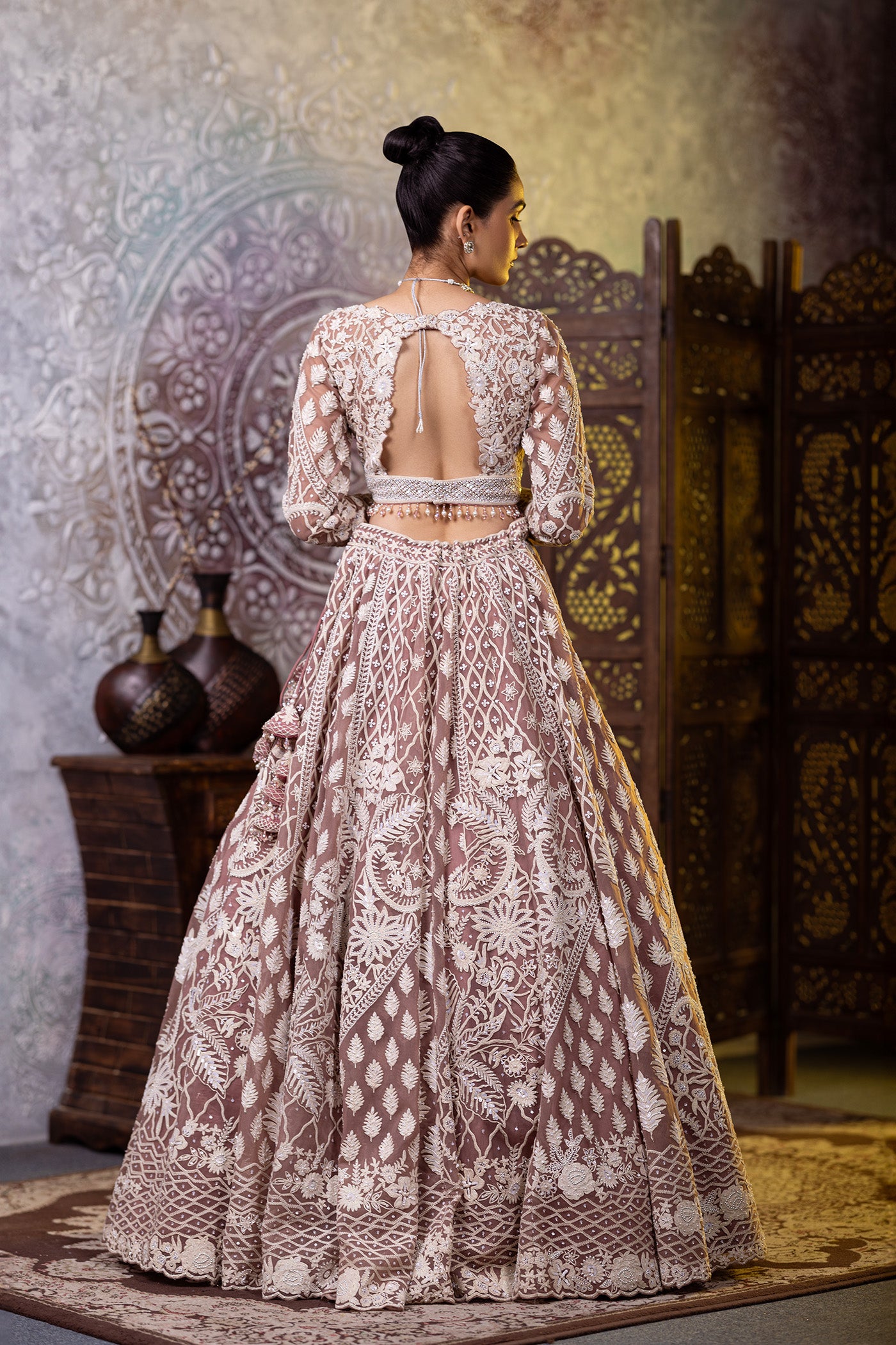 Net blush lehenga choli with dupatta