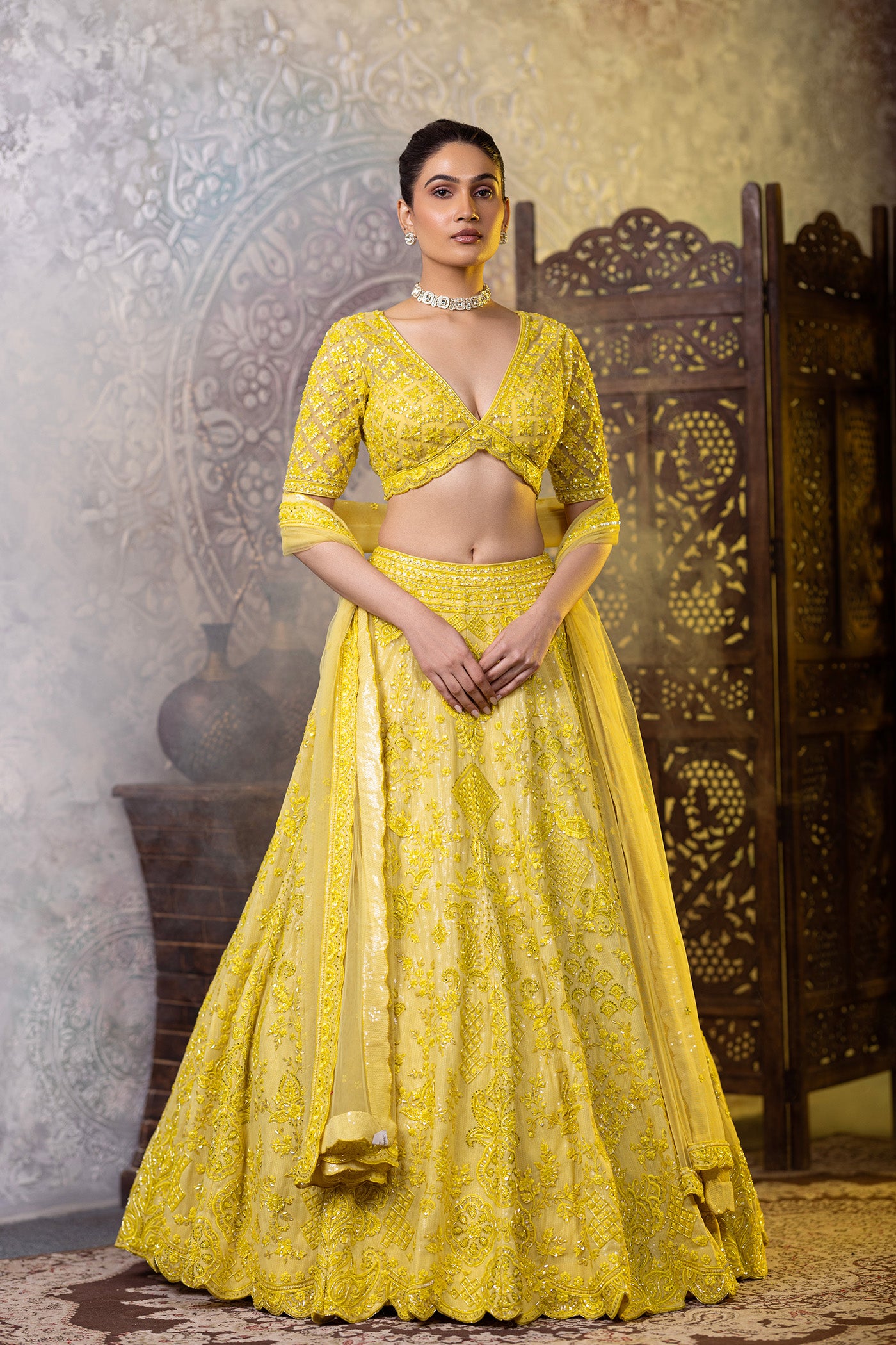 Yellow lehegna choli with sequins work