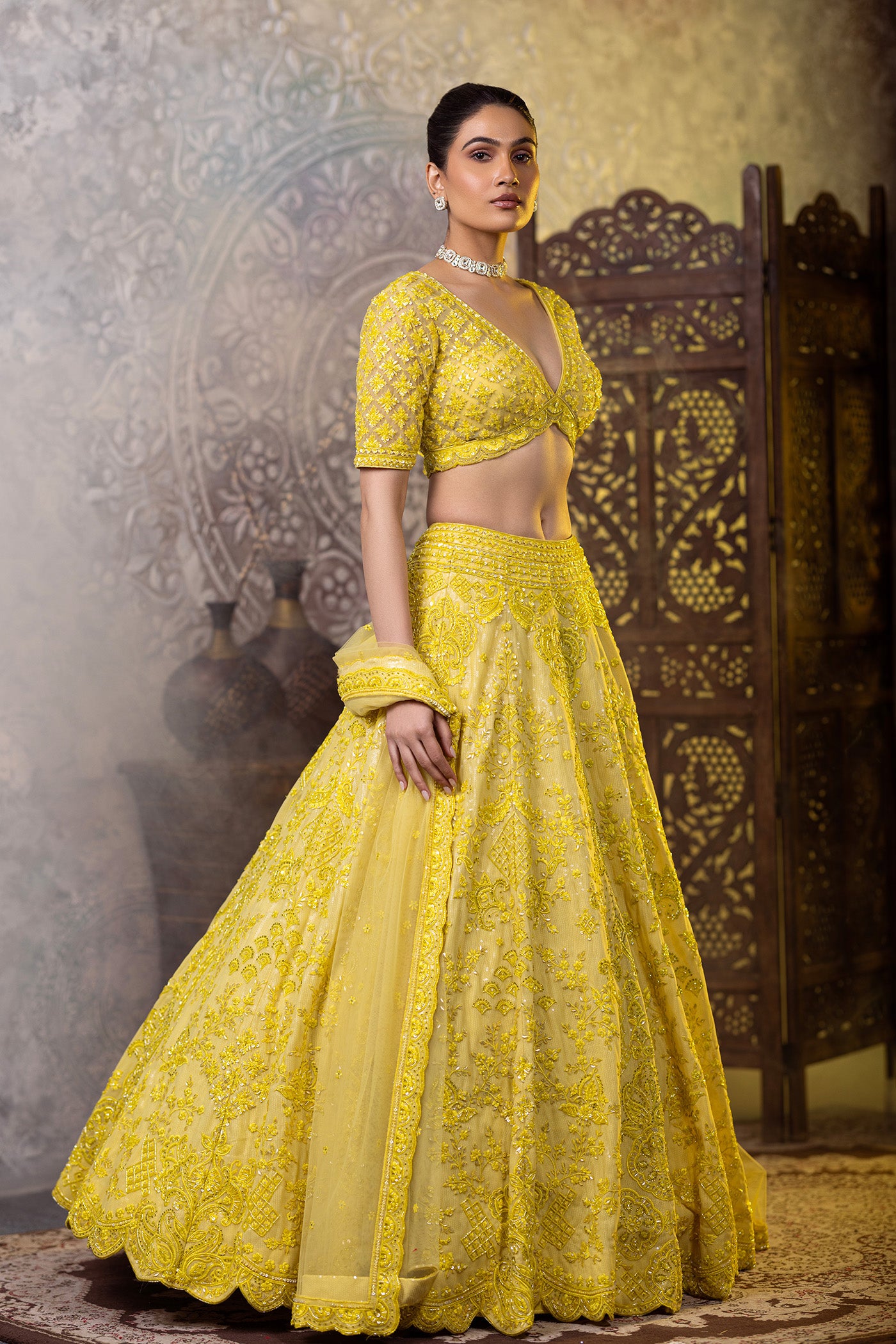 Yellow lehegna choli with sequins work