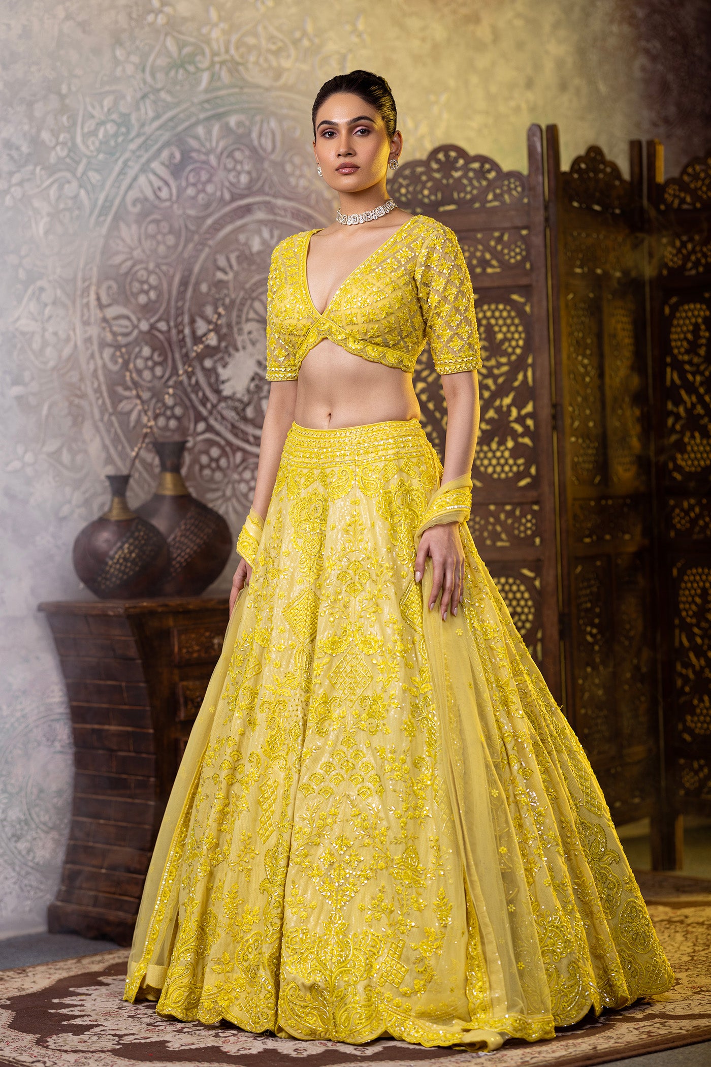 Yellow lehenga choli with sequins work