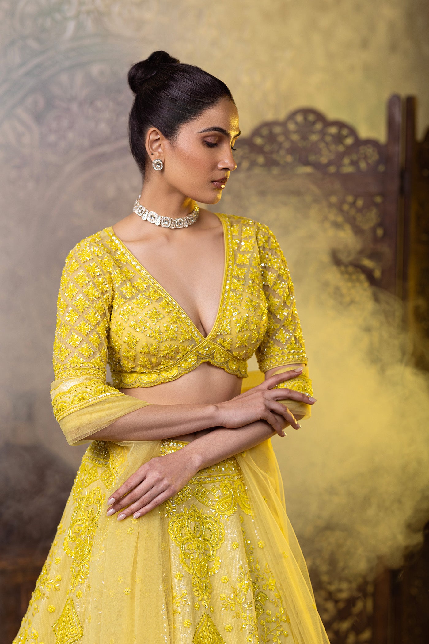 Yellow lehenga choli with sequins work