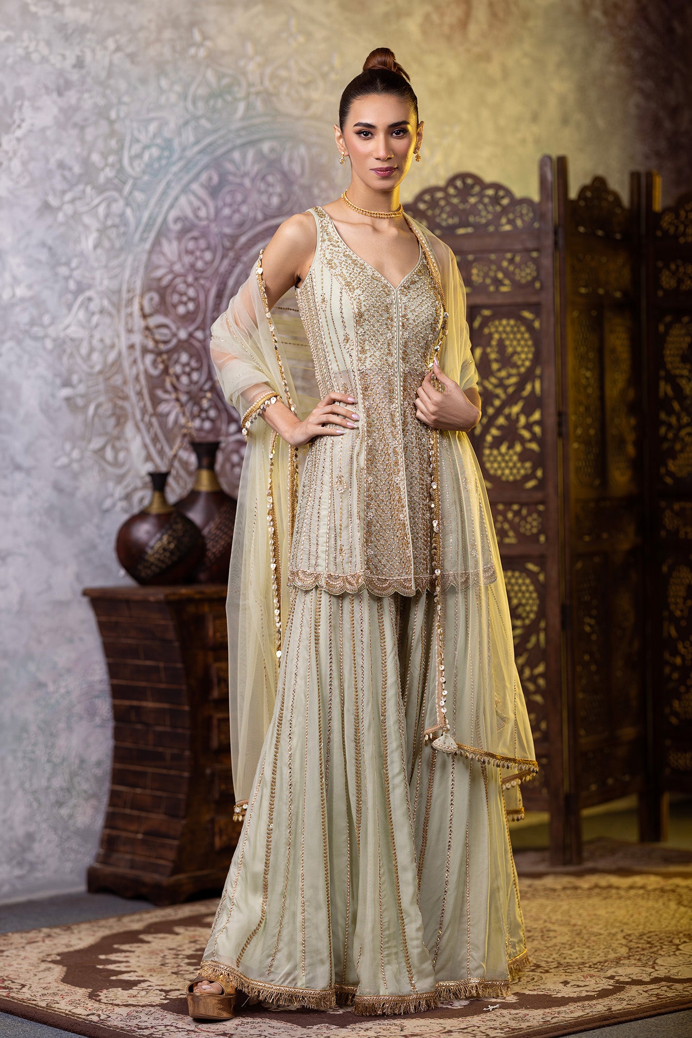 Organza peplum suit with sharara and dupatta