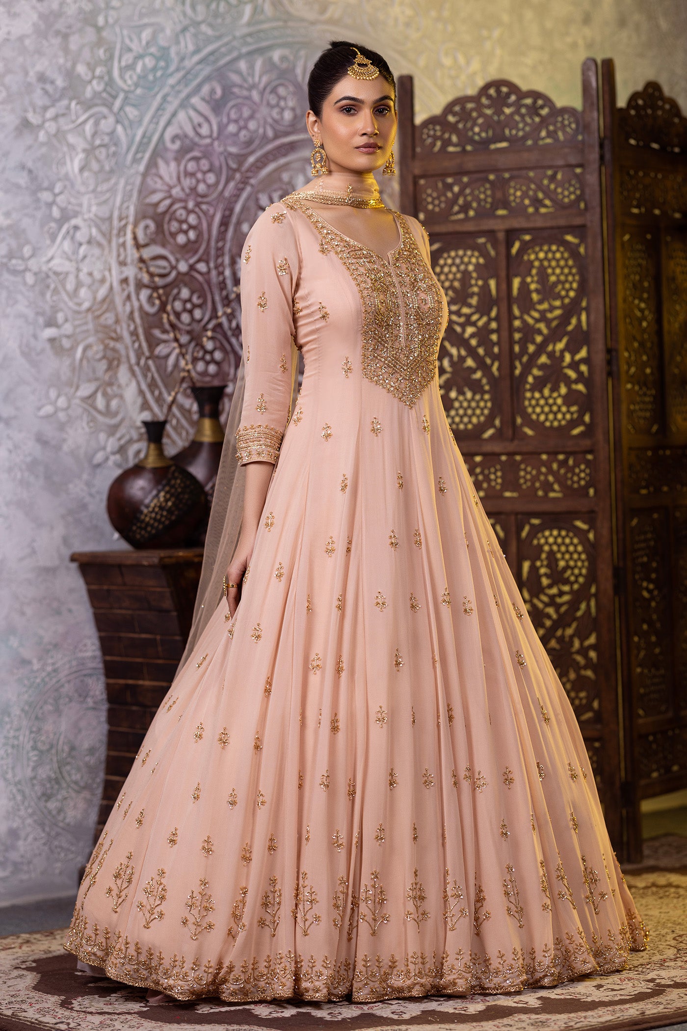 Peach gold anarkali suit with sequins Peach gold anarkali suit with sequins