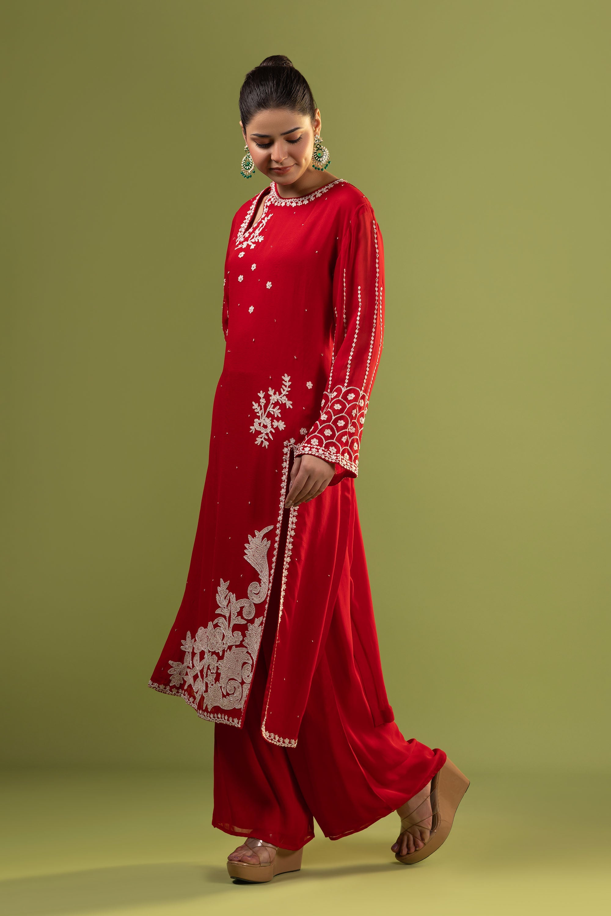 Red suit with aari work