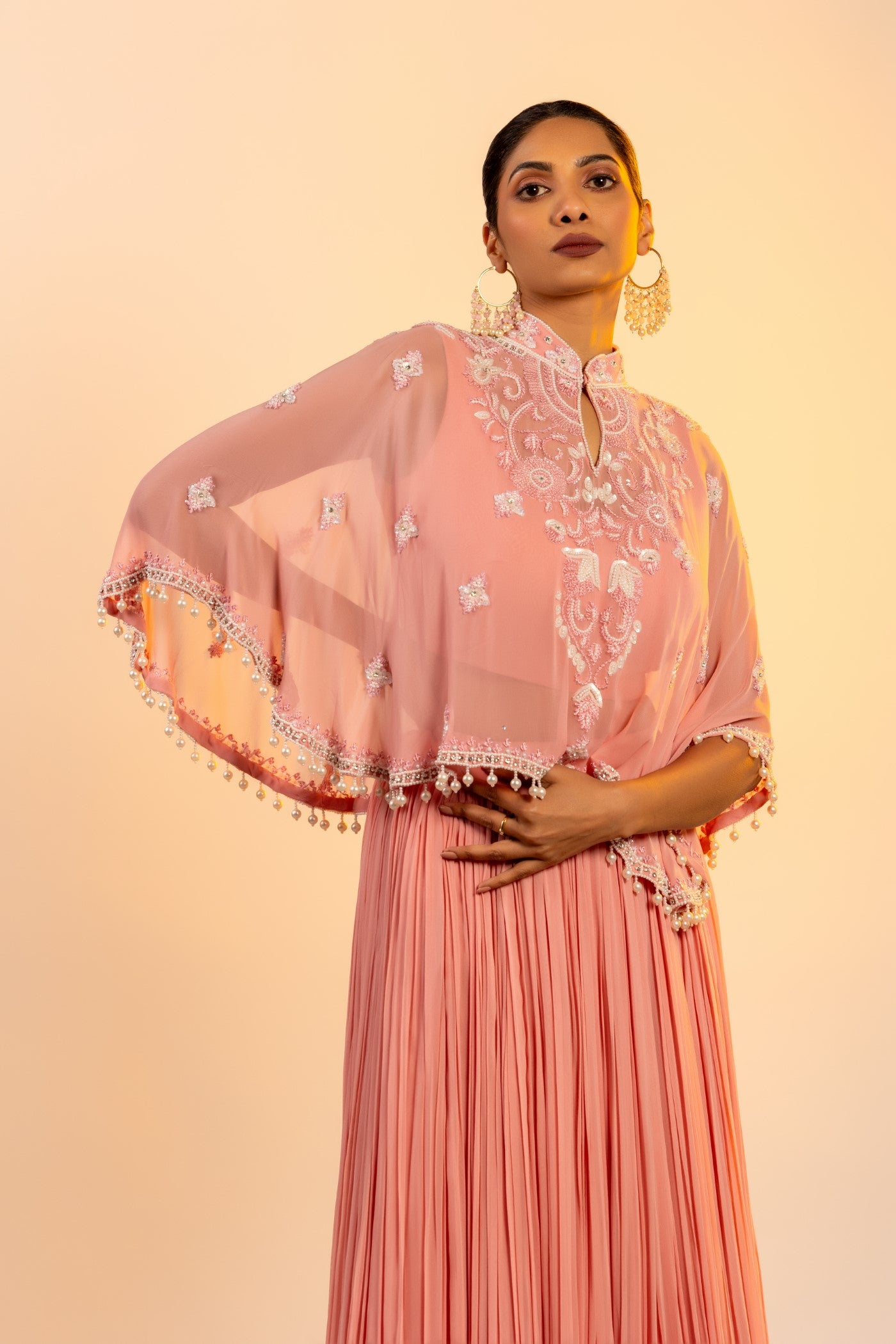 Pink georgette crop top and skirt with poncho