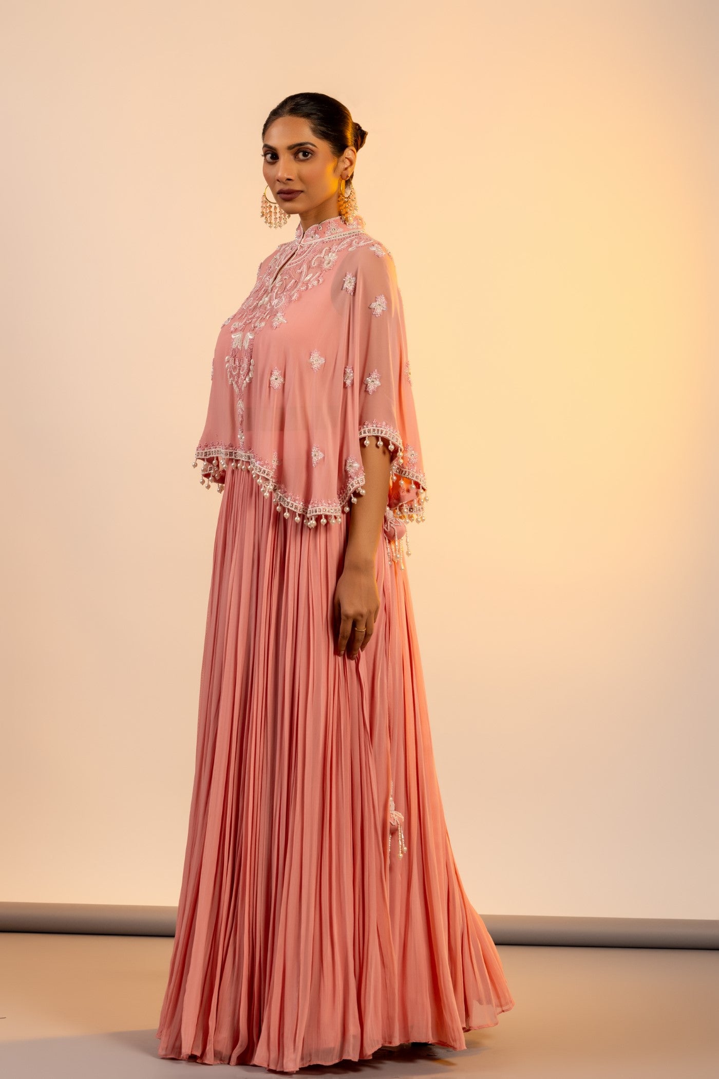Pink georgette crop top and skirt with poncho