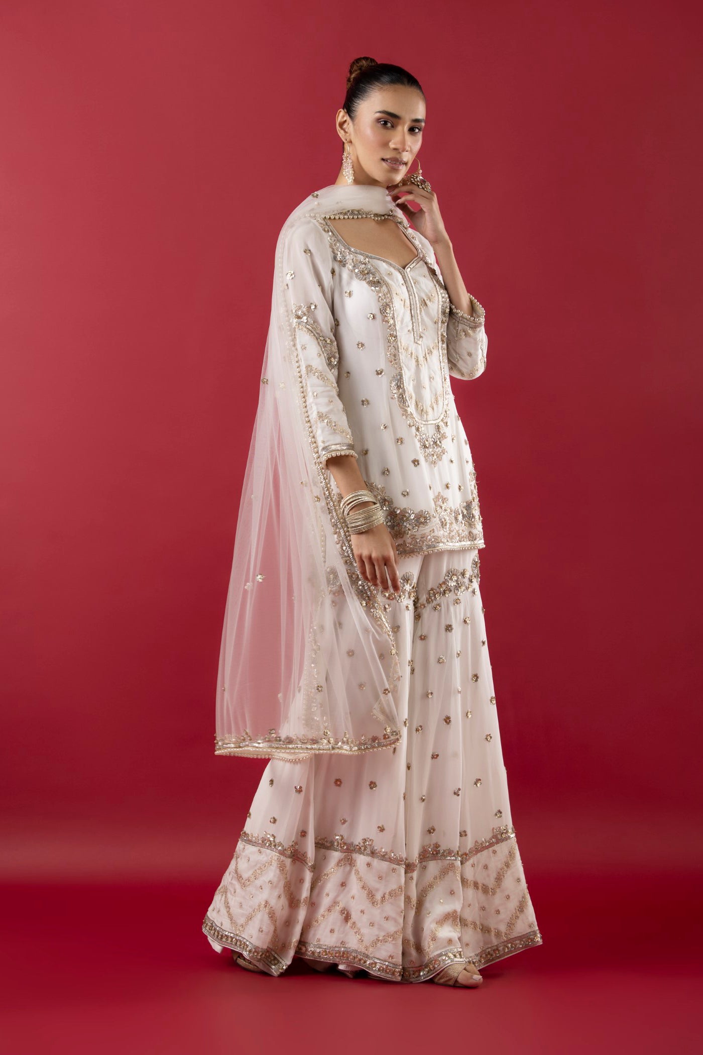 White Georgette Gharara Suit With Pearl, Sequins And Poth Work