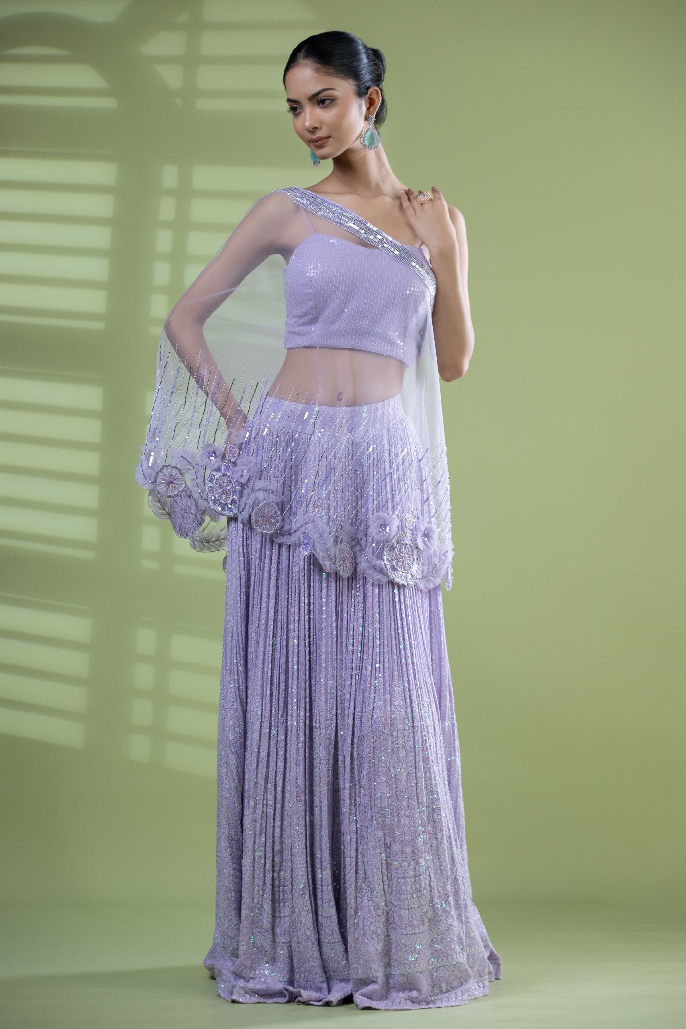 Lycra mauve crop top with poncho amd skirt