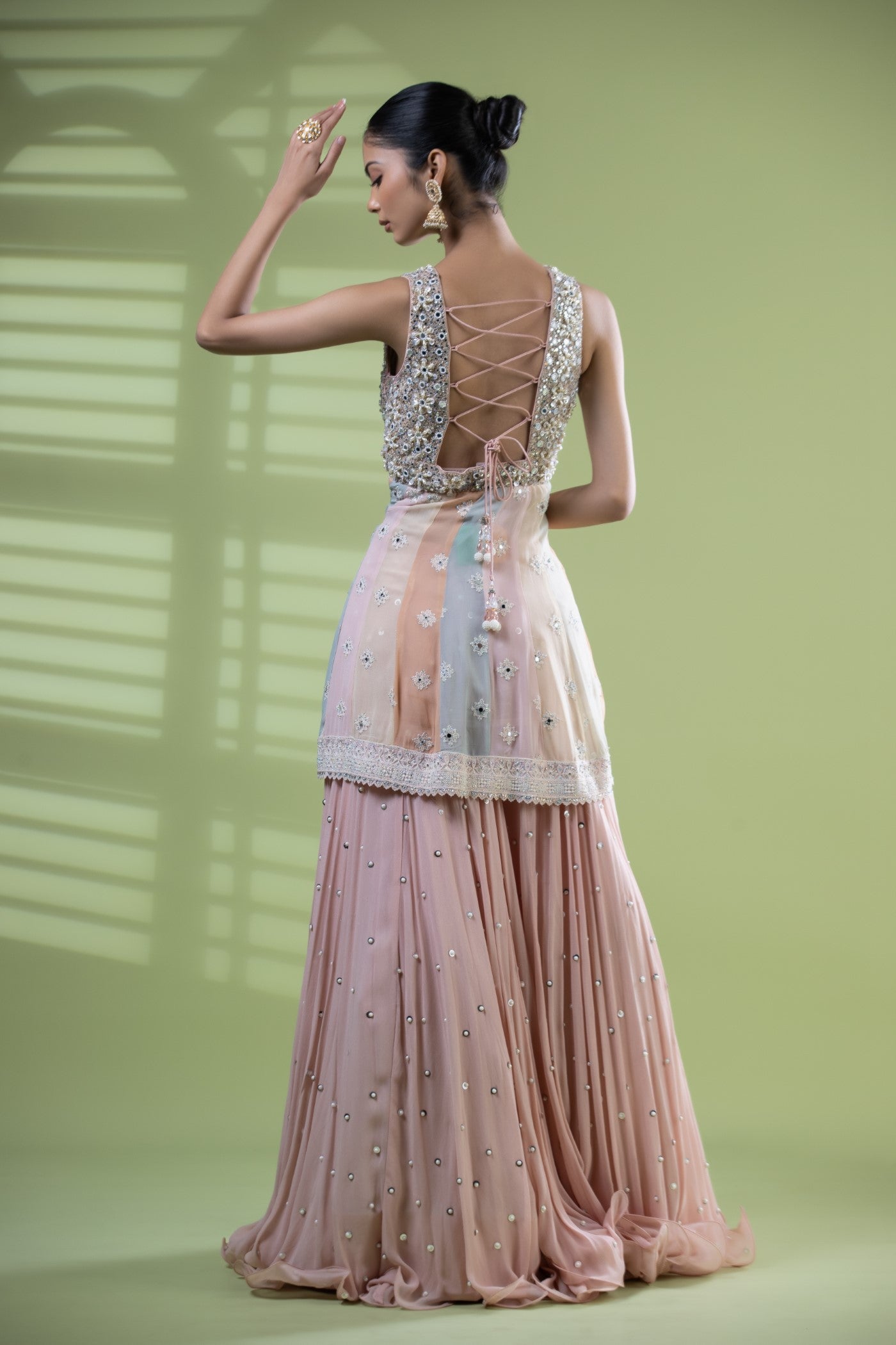 Blush pink lakhnavi short peplum and lehenga