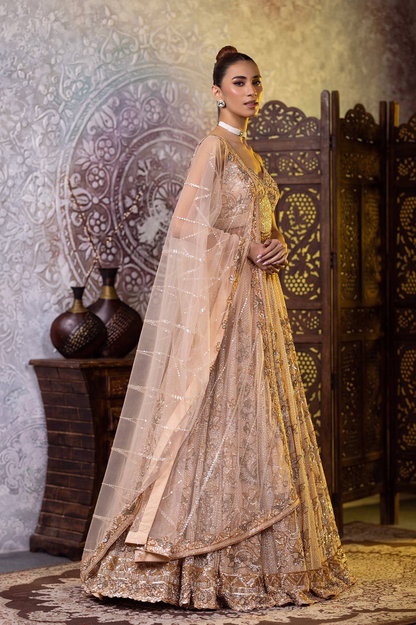 Peach net lehenga with sequins