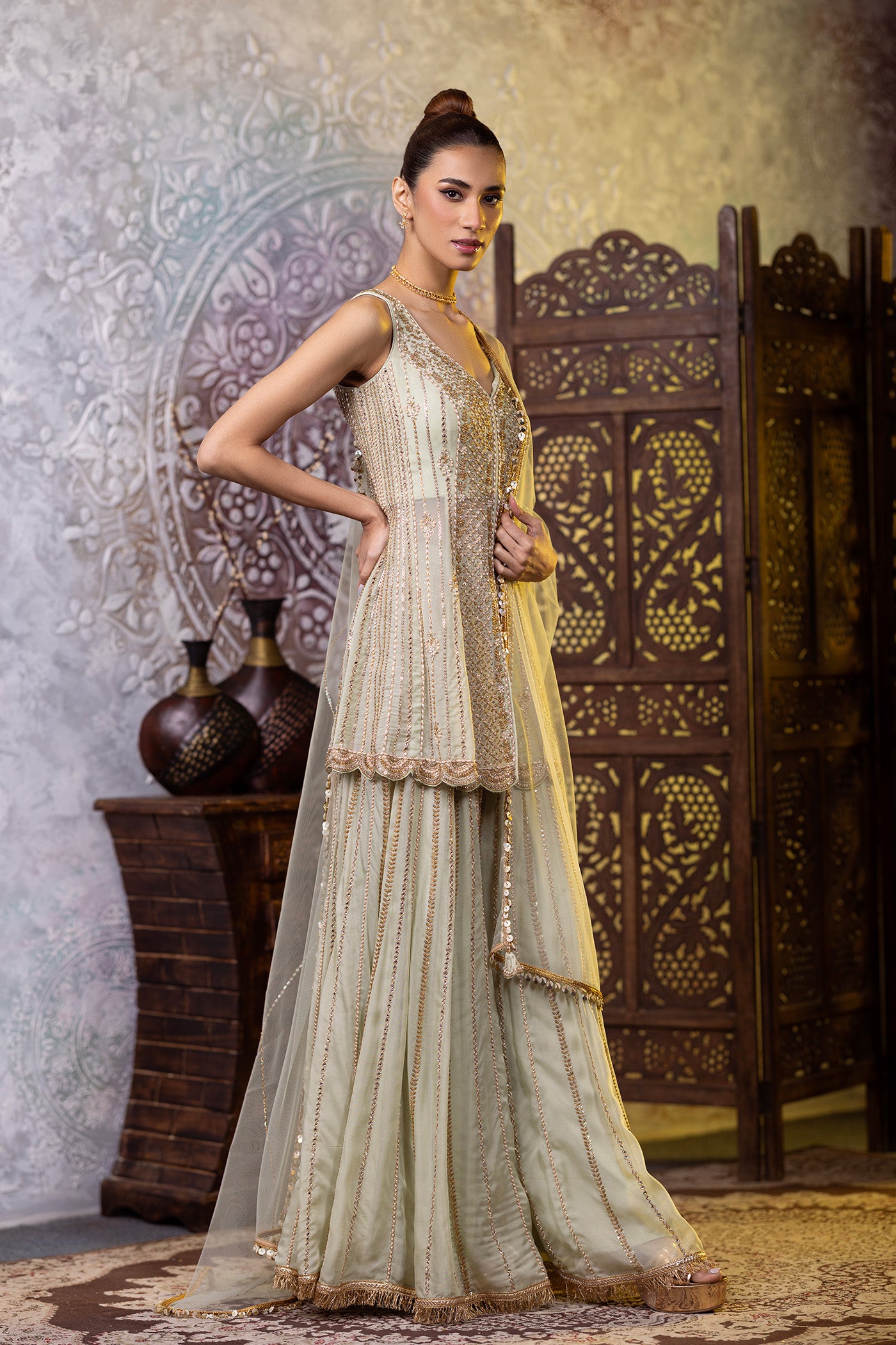 Organza peplum suit with sharara and dupatta