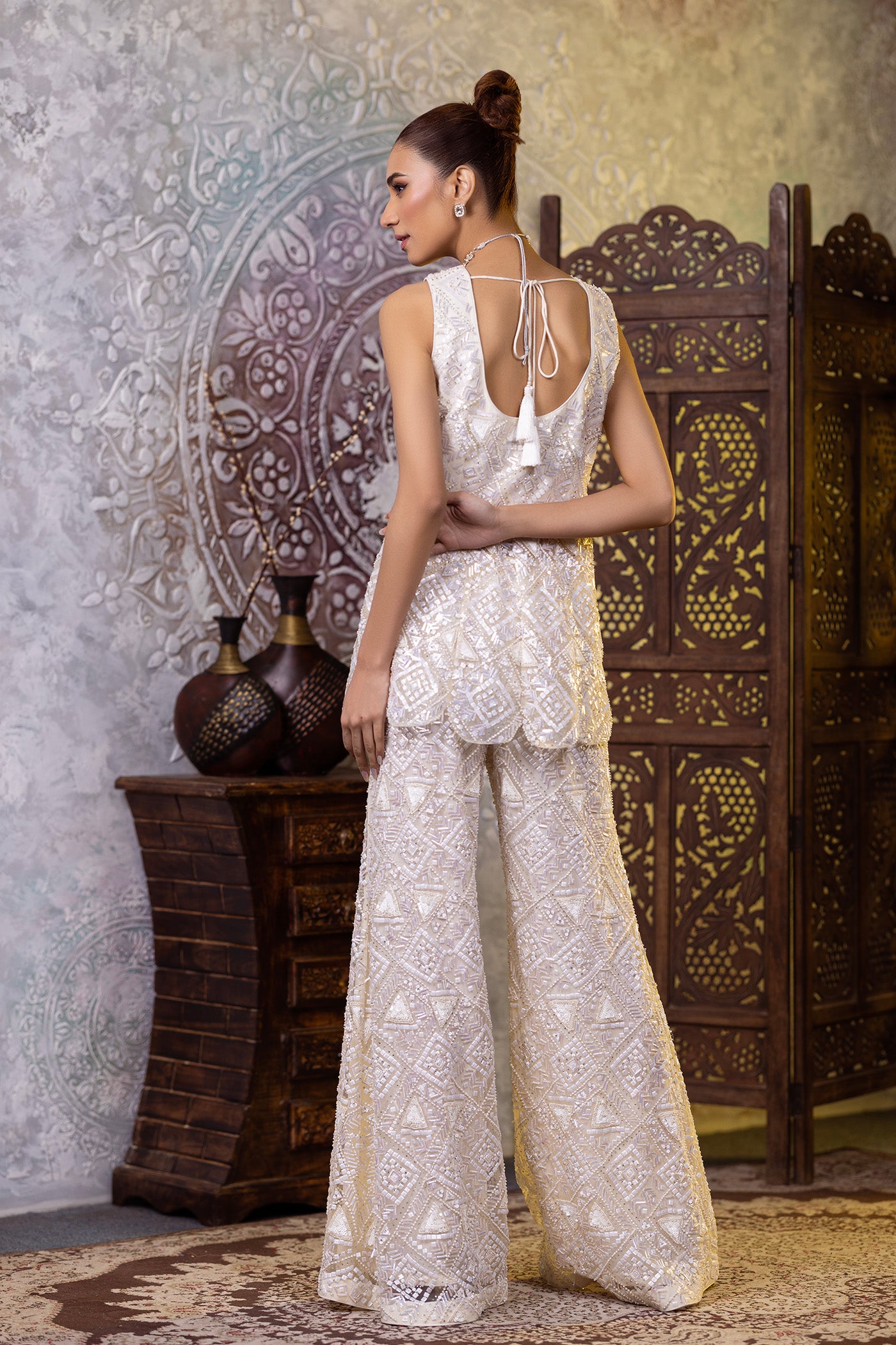 Ivory net sequined peplum with bellbottoms